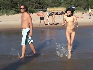 Watch the tits in the water from this nudist teen