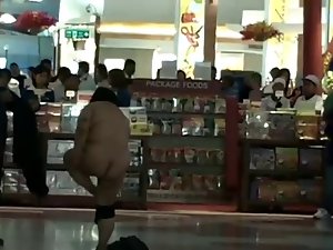Asian female nude inside airport