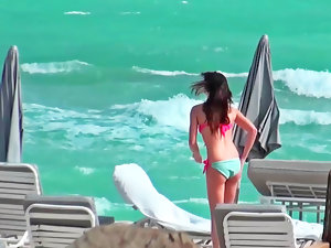 Diminutive slutty girl is caught at the beach and is brought inside